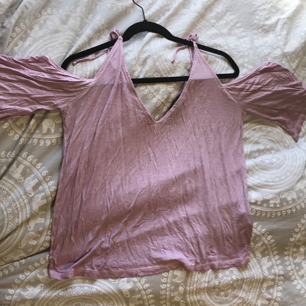 Contemporary peekaboo shoulder top